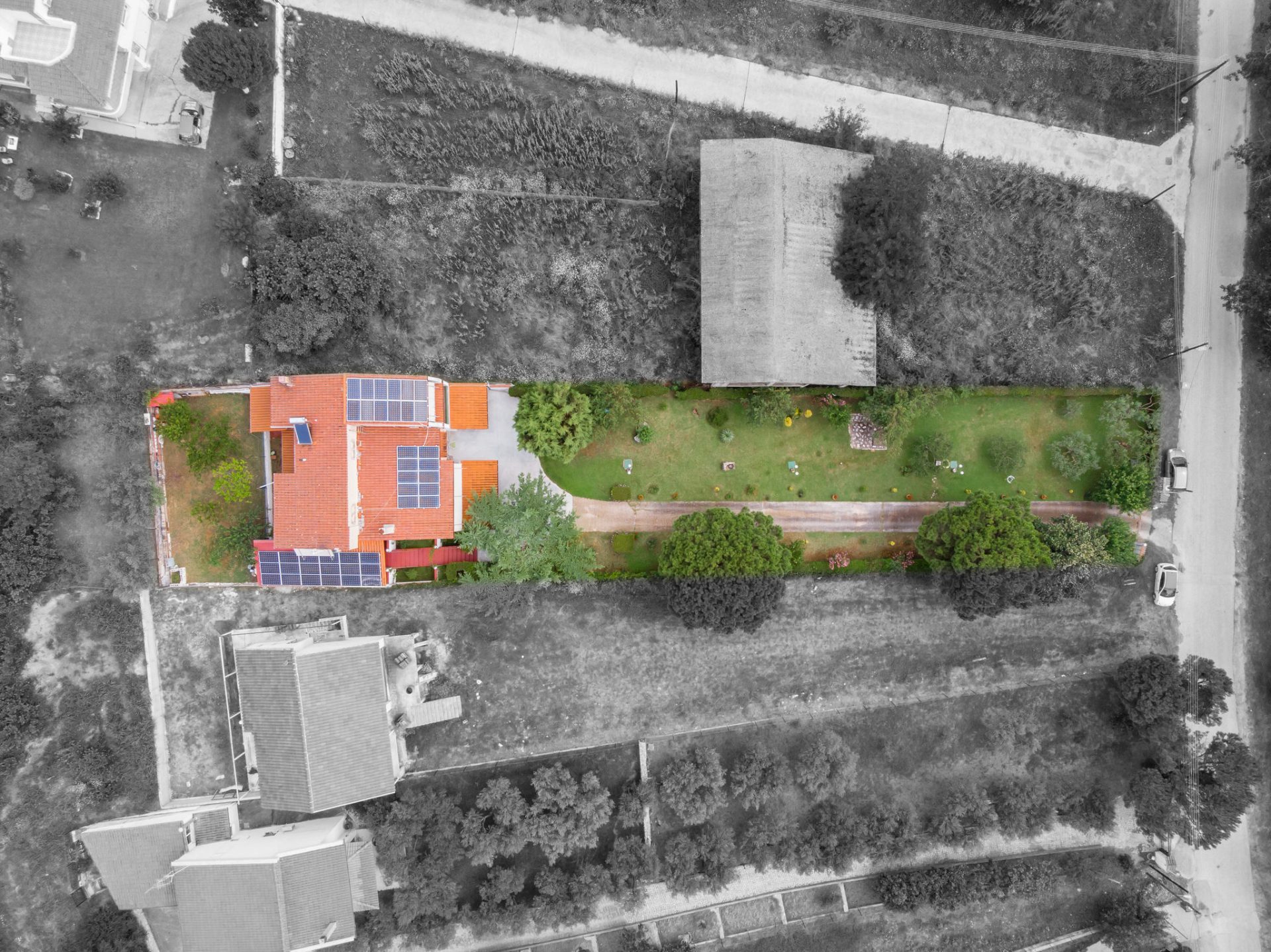 high contrast view from above image, showcasing the property